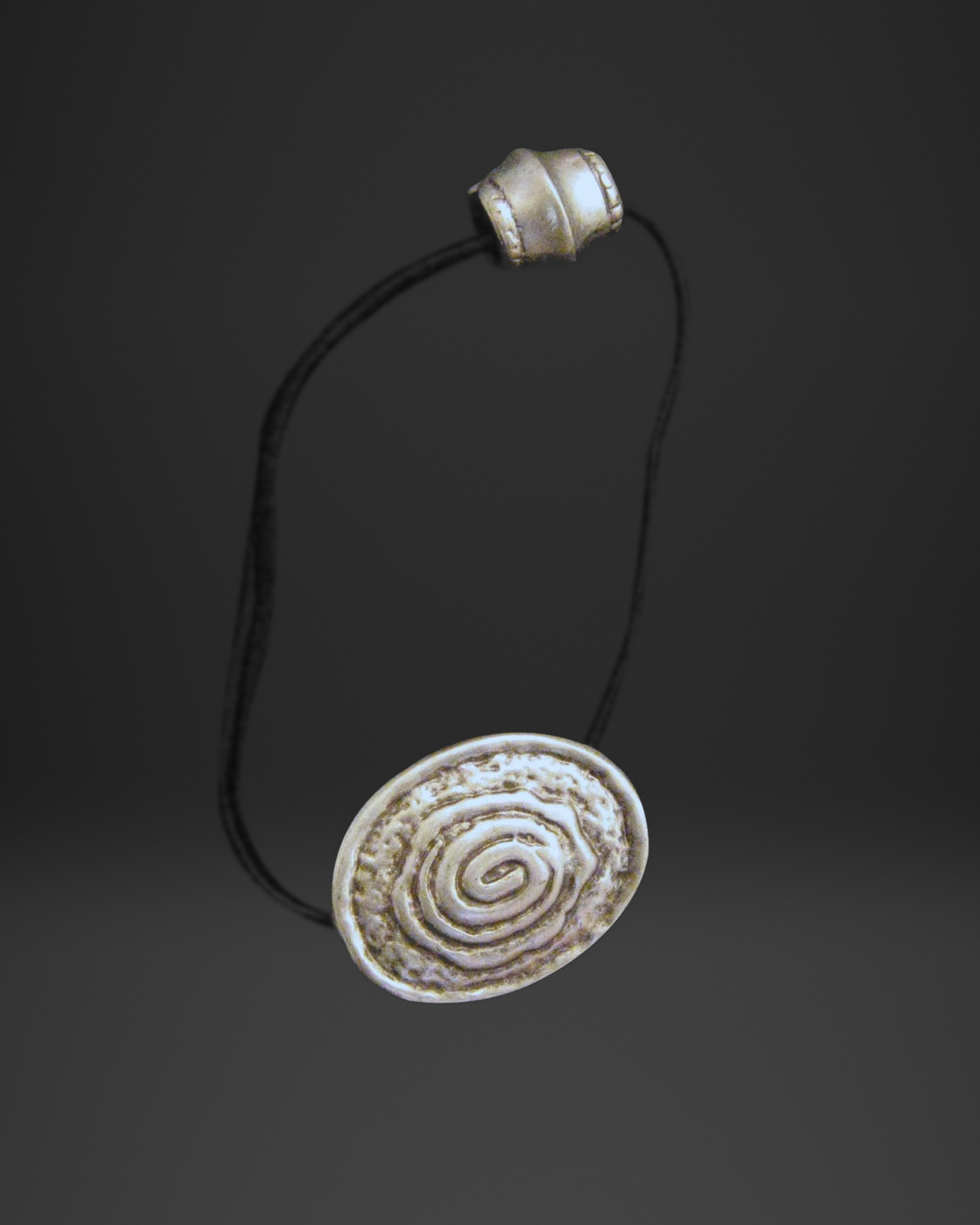 Raised Spiral Oval Hair Tie